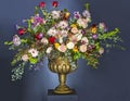 A Beautiful large flower bouquet with a lot of different flowers in a golden pot Royalty Free Stock Photo