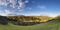 Beautiful large panorama landscape of countryside on bright Spring morning with blue sky Royalty Free Stock Photo