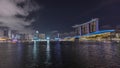 Beautiful laser and musical fountain show at the Marina Bay Sands waterfront in Singapore night timelapse Royalty Free Stock Photo