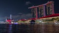 Beautiful laser and musical fountain show at the Marina Bay Sands waterfront in Singapore night timelapse Royalty Free Stock Photo