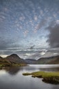 Beautiful late Summer landscape image of Wasdale Valley in Lake District, looking towards Scafell Pike, Great Gable and Kirk Fell