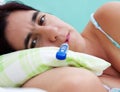 Beautiful latin woman sick in bed Royalty Free Stock Photo