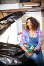 Beautiful laughing automechanic. beauty portrait Royalty Free Stock Photo