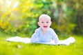 Beautiful laughing baby in the garden Royalty Free Stock Photo