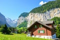 Beautiful Lauterbrunnen village with famous Staubbach Falls in background. One of major tourist attractions in Switzerland.