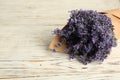 Beautiful lavender bouquet on white wooden table, closeup. Space for text Royalty Free Stock Photo