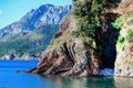 Beautiful layered cliffs on a background of blue sea