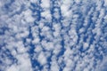 Beautiful layered cumulus clouds on a blue sky background. Stratocumulus clouds