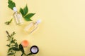 Beautiful layout of cosmetic products on a yellow background. Natural cosmetics for face and body Royalty Free Stock Photo