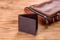 Beautiful leather brown purse made of leather to store paper money Royalty Free Stock Photo