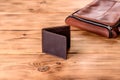 Beautiful leather brown purse made of leather to store paper money Royalty Free Stock Photo