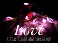 Love quote from bible verse with led love lights decoration background.