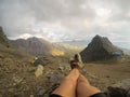 Beautiful legs against the background of mountain peaks