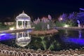 Beautiful leisure park with gazebo and pond with night lighting. North Cyprus landscape Royalty Free Stock Photo