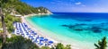Beautiful Lemonakia beach,view with turquoise sea and mountains,Samos island,Greece. Royalty Free Stock Photo