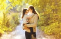 Beautiful lifestyle autumn photo mother and child walks