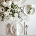 Beautiful light beige and white colors morning table decoration tablecloth and napkins, big white roses blossom bouquet, silver Royalty Free Stock Photo