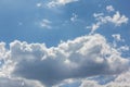 Beautiful light blue sky with puffy white clouds Royalty Free Stock Photo