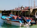 Beautiful light blue water of beach water two motor boat at beach Royalty Free Stock Photo