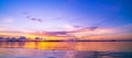 Beautiful light sunset or sunrise over sea scenery nature background with reflex in the water surface Royalty Free Stock Photo