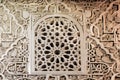 Beautiful light window with patterns on historical arabic style walls, 14th century Madraza de Granada, Spain Royalty Free Stock Photo