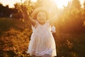 Beautiful lightbeam. Mother with boy and girl spending free time on the field at sunny day time of summer