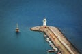 Beautiful lighthouse on a large pier from the top view Royalty Free Stock Photo