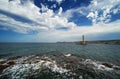 Beautiful lighthouse over cloudy sky