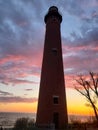 Beautiful lighthouse summertime sunset. Royalty Free Stock Photo