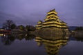 Beautiful lightup scenic of Matsumoto castle in sunset time Royalty Free Stock Photo