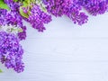 Beautiful lilac flower blossom summer romantic bouquet summercard season on white wooden background frame Royalty Free Stock Photo