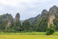 Beautiful limestome mountain range at Ban Mung Village, Noen Maprang District, Phitsanulok, Thailand Royalty Free Stock Photo