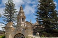 Beautiful limestone archway in front of Naxxar parish church, viewed from Palazzo Parisio, Naxxar, Malta, Europe. June 2016. Royalty Free Stock Photo