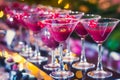 Beautiful line of different colored alcohol cocktails with smoke on a Christmas party, tequila, martini, vodka, and others on part