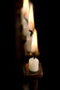 Beautiful lit hanukkah menorah on black. Royalty Free Stock Photo