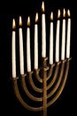 Beautiful lit hanukkah menorah on black background Royalty Free Stock Photo