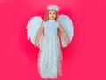 Beautiful little angel girl. Portrait of innocent girl angel with angelic wings. Child with angelic character. Toddler Royalty Free Stock Photo
