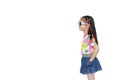 Beautiful little Asian kid girl wearing a flowers summer dress and sunglasses isolated on white background with copy space. Summer Royalty Free Stock Photo