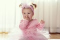 Funny baby girl chewing hand Royalty Free Stock Photo