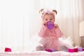 Baby girl drinking water from a bottle Royalty Free Stock Photo