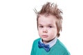 Beautiful little boy in blue bow tie and green sweater, isolated on white background Royalty Free Stock Photo