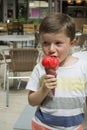 Beautiful little boy eating ice cream. Royalty Free Stock Photo