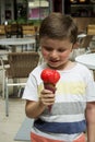 Beautiful little boy eating ice cream. Royalty Free Stock Photo