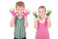 Beautiful little boy and girl with hands in the paint Royalty Free Stock Photo