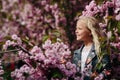 Beautiful little child girl with sakura flowers Royalty Free Stock Photo