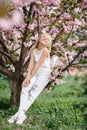 Beautiful little child girl with sakura flowers Royalty Free Stock Photo