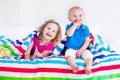 Beautiful little children sleeping under colorful blanket Royalty Free Stock Photo