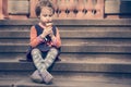 Beautiful little cute child girl eating ice cream in the summer Royalty Free Stock Photo