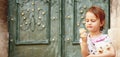 Beautiful little cute child girl eating ice cream in the summer Royalty Free Stock Photo