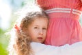 Beautiful little daugher hugging her mother Royalty Free Stock Photo